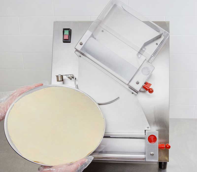 https://www.verfoodsolutions.com/wp-content/uploads/2019/06/counter-top-automatic-pizza-dough-roller-4.jpg